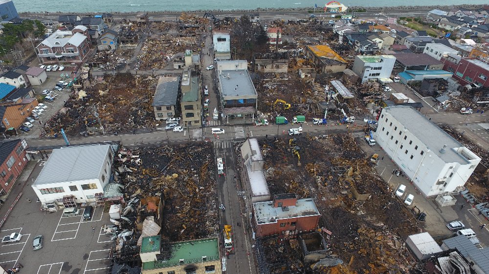 image2:Recovery（Overcoming Disaster,Building a New Town）